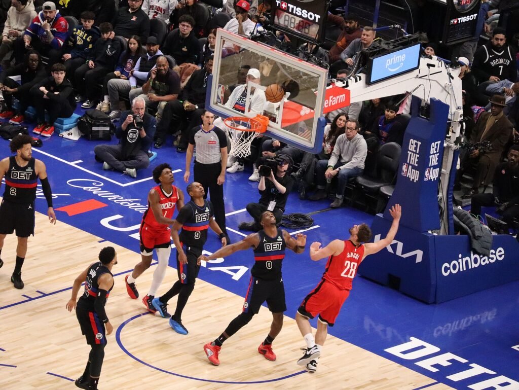 Alperen Sengun drives to the rim against Detroit defense during a game impacted by the Rockets' Primetime Snub.