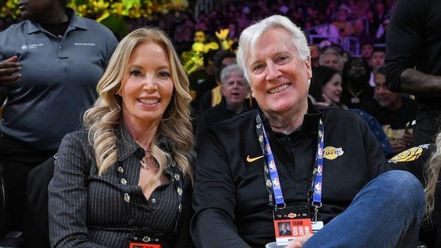 Jeanie Buss and Mark Walter courtside prior to the Lakers ownership change